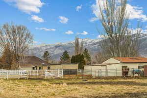 Property view of mountains with a rural view