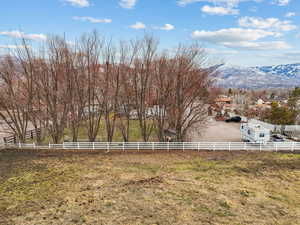 View of yard featuring a mountain view and a rural view