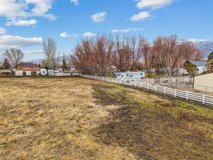 View of yard featuring a mountain view and a rural view