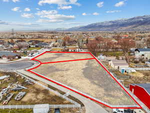 Birds eye view of property with a mountain view