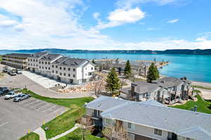 Aerial view of residential area with a large body of water