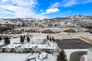 Snowy aerial view with a mountain view