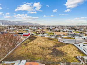 Drone / aerial view featuring a mountain view