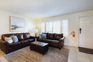 View of tiled living room