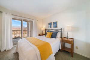 Bedroom 1 featuring a mountain view,  and access to outside