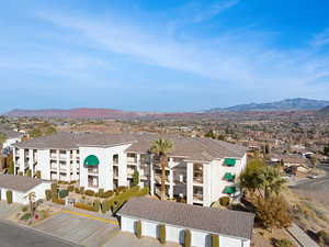 Birds eye view of property with a mountain view