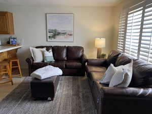 Living room featuring light tile patterned flooring