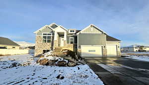 Craftsman inspired home with a garage