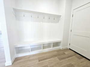 Mudroom with light wood-type flooring