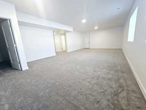 Basement with carpet flooring