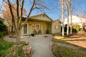 Back of property featuring a patio