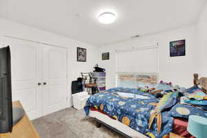 Bedroom featuring a closet