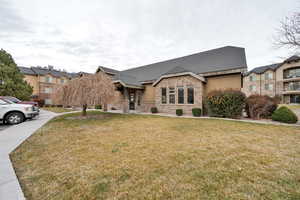 View of front of home featuring a front yard