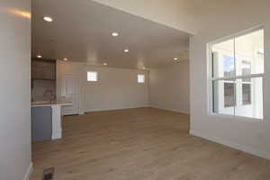 Family room with upgraded laminate flooring