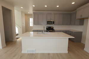 Kitchen with upgrades throughout