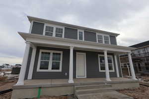 View of front of property with covered porch