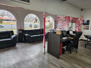 Office area featuring hardwood / wood-style flooring