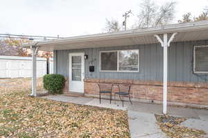 Exterior space featuring covered porch