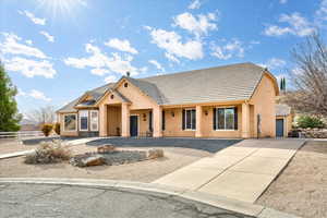 View of front of property with a garage