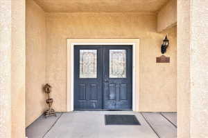 Property entrance with french doors