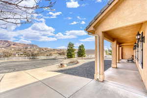 View of patio with a mountain view