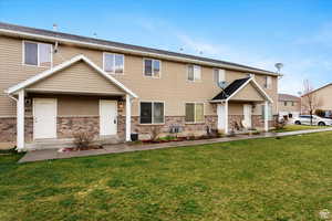 View of front of property. Faces east with view of the mountains.