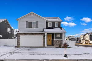 Front of property with a garage