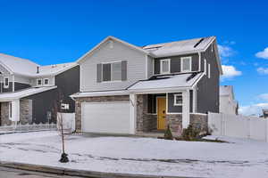 View of front of home featuring a garage