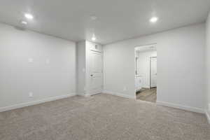 View of carpeted spare room