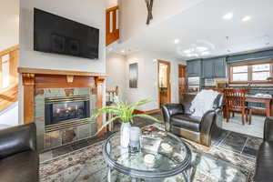 Living room with a tiled fireplace