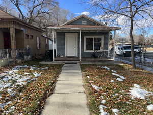 Bungalow-style house with a porch