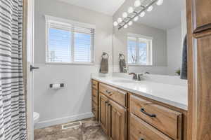 Extra large vanity and natural wood cabinets