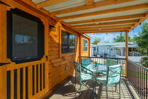 Inviting covered deck. Table & chairs Included!