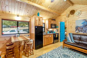 Vaulted Ceilings & Real Wood floors.