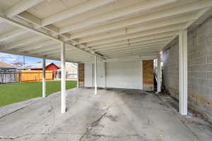 Carport Area with 1 Car Garage