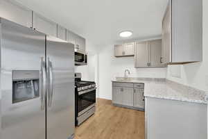 Beautiful Kitchen with new cabinets, granite counters and Stainless Appliances