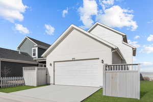 View of front of house with a garage