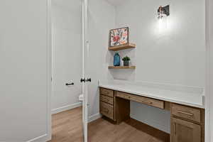 Bathroom featuring toilet and hardwood / wood-style floors