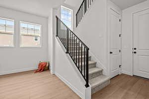 Staircase with wood-type flooring