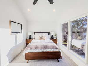 Bedroom featuring ceiling fan and vaulted ceiling