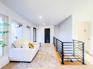 Living room with light wood-type flooring