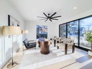 Living area featuring ceiling fan