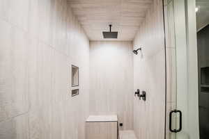 Bathroom featuring walk in shower