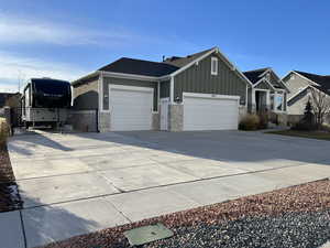 View of front of home featuring a garage