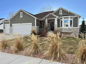 Craftsman-style house with a garage