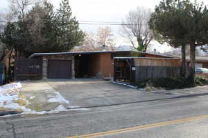 View of front of home with a garage