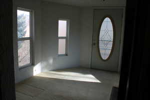 View of carpeted foyer