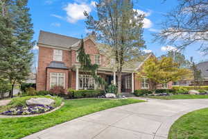 View of front of house featuring a front lawn