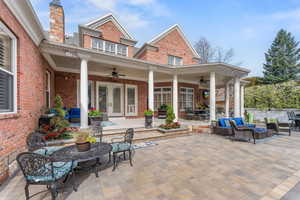 View of patio / terrace with ceiling fan and an outdoor hangout area