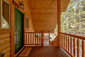 Wooden deck featuring a porch